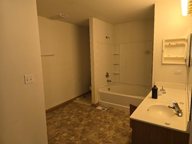 full bathroom featuring toilet, washtub / shower combination, and vanity