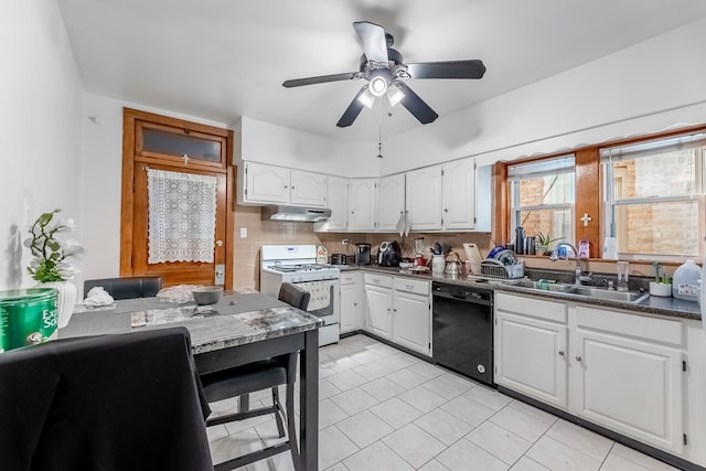 kitchen with dishwasher, white gas range, white cabinets, and sink