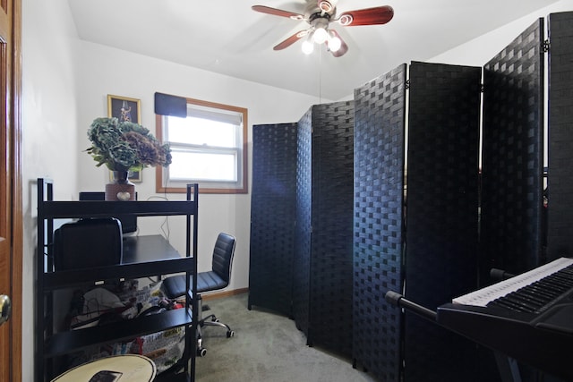 office area with light colored carpet and ceiling fan