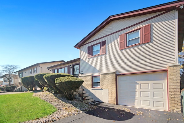 view of home's exterior with a garage