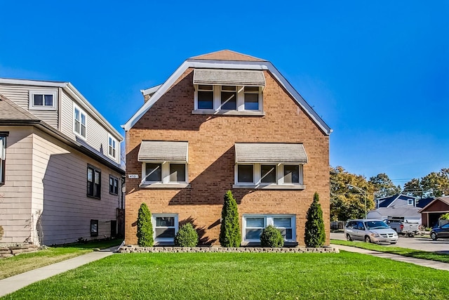 view of front of property with a front yard