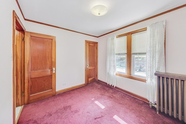 unfurnished bedroom with crown molding and carpet