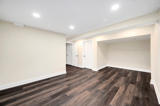 basement featuring dark hardwood / wood-style floors