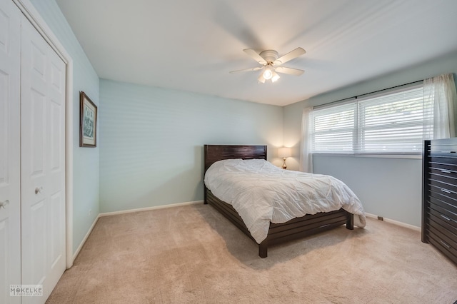 1019 N Webster St, Naperville, IL 60563 - bedroom featuring light carpet, baseboards, a ceiling fan, and a closet