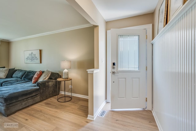 1019 N Webster St, Naperville, IL 60563 - entryway with light wood finished floors, ornamental molding, and baseboards