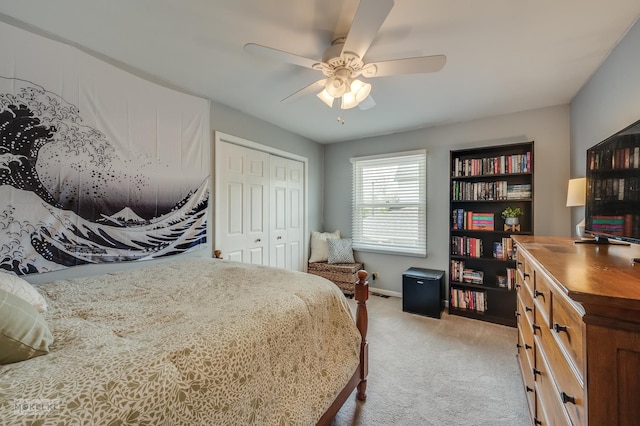 1019 N Webster St, Naperville, IL 60563 - bedroom with light colored carpet, a closet, and ceiling fan