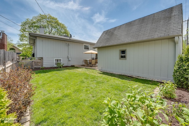 1019 N Webster St, Naperville, IL 60563 - rear view of property with a shingled roof, a patio area, and a chimney