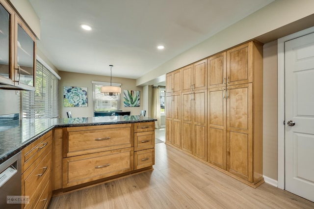 1019 N Webster St, Naperville, IL 60563 - kitchen with light wood-style floors, a peninsula, glass insert cabinets, recessed lighting, and dark stone countertops