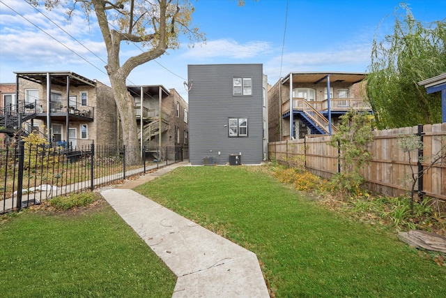 view of community featuring a lawn