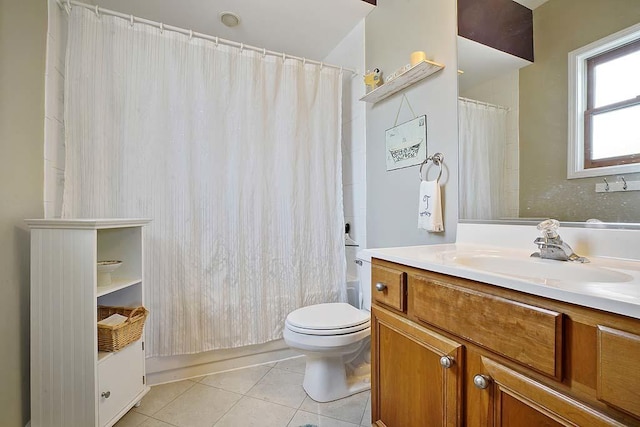 full bathroom featuring tile patterned flooring, vanity, shower / tub combo, and toilet