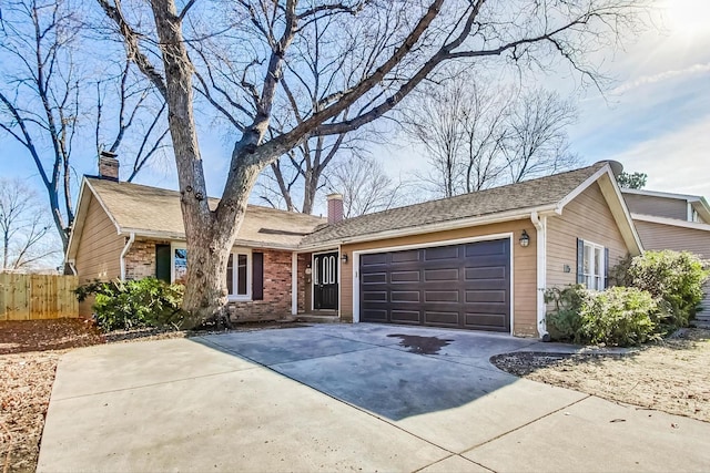 ranch-style home with a garage