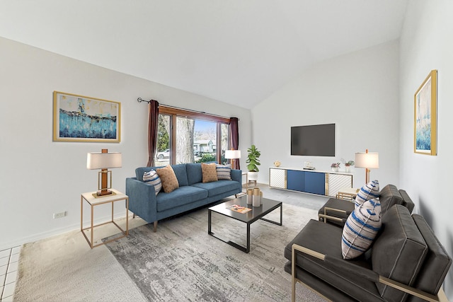 carpeted living room featuring vaulted ceiling