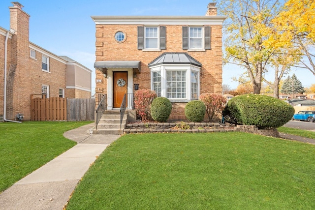 view of front of house with a front lawn