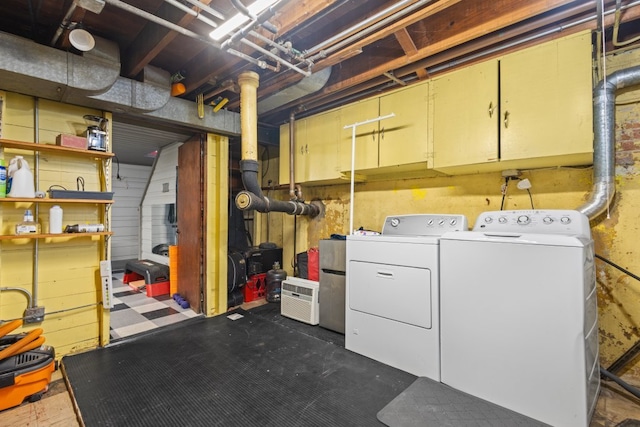 basement featuring washer and dryer