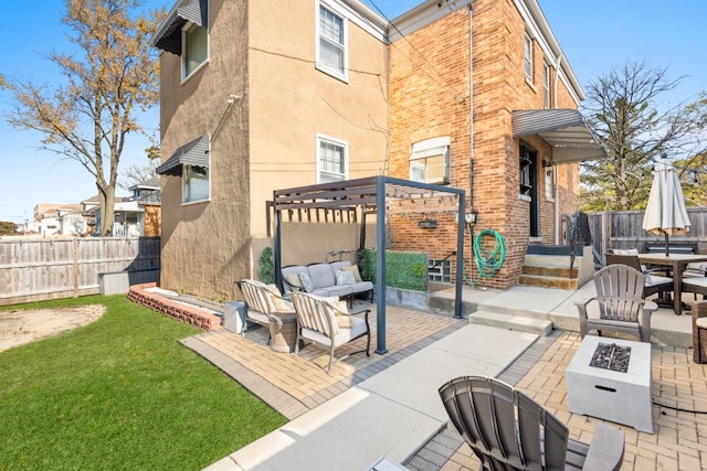 view of patio featuring an outdoor fire pit