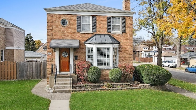 view of front facade with a front lawn