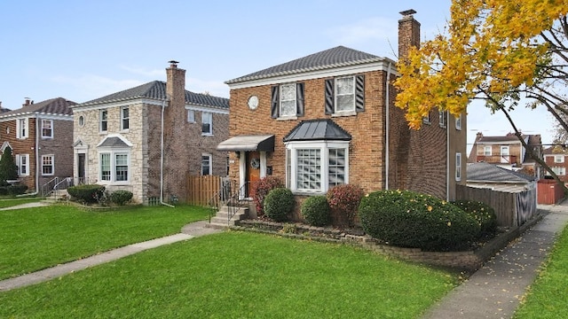 view of front of house with a front lawn