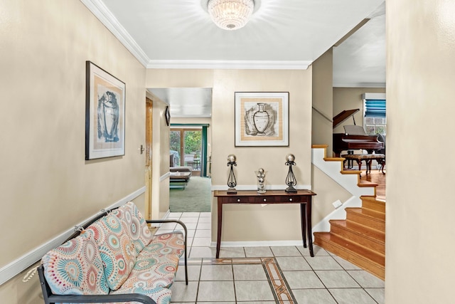 hallway featuring crown molding and light tile patterned floors