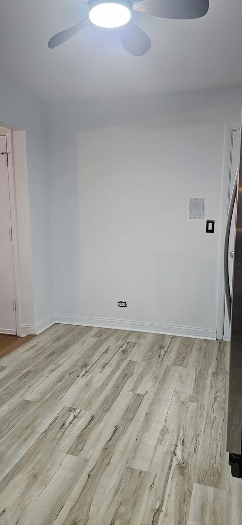 empty room with light wood-type flooring