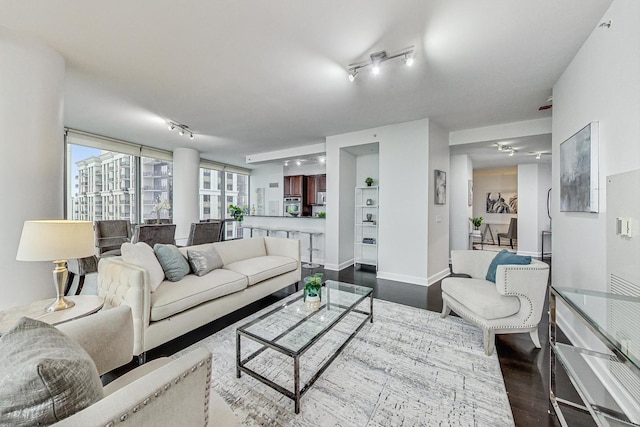 living room with hardwood / wood-style flooring