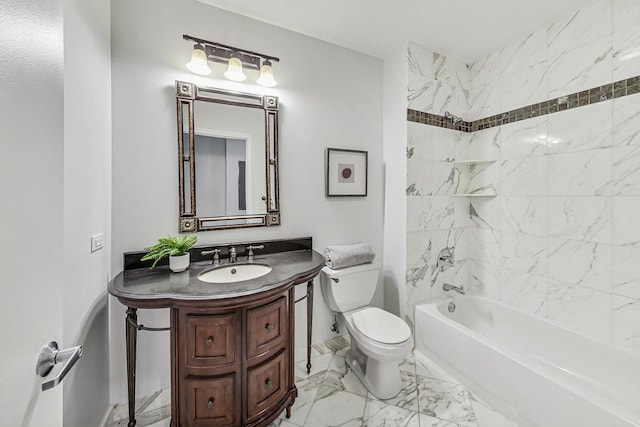 full bathroom with vanity, toilet, and tiled shower / bath