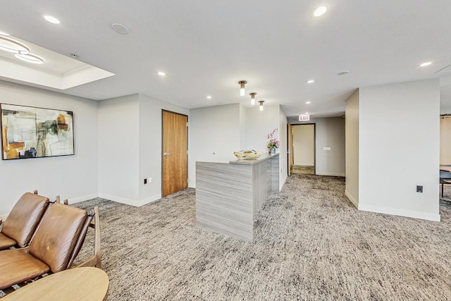 living room featuring light carpet