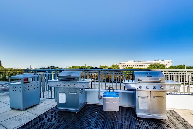 view of patio with a balcony and grilling area