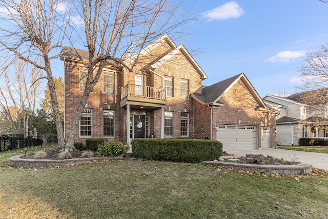 view of front property featuring a balcony, a garage, and a front lawn