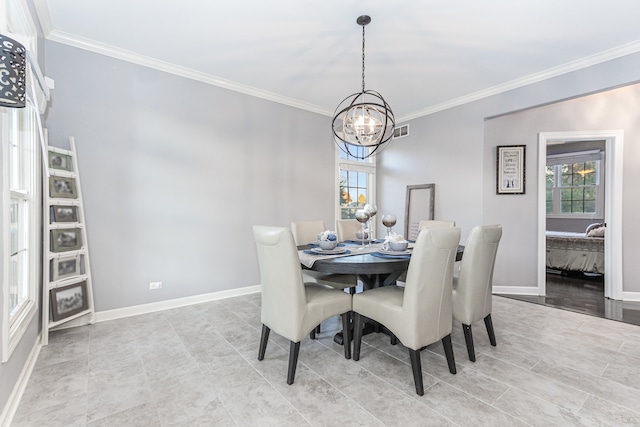 dining space featuring light wood-type flooring, an inviting chandelier, and ornamental molding