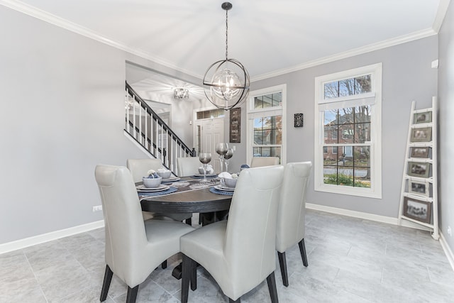 dining space with crown molding and an inviting chandelier