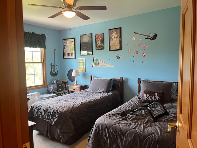 bedroom featuring carpet and ceiling fan