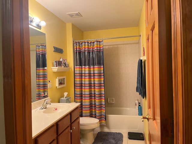 full bathroom with toilet, vanity, shower / bath combo with shower curtain, and tile patterned floors