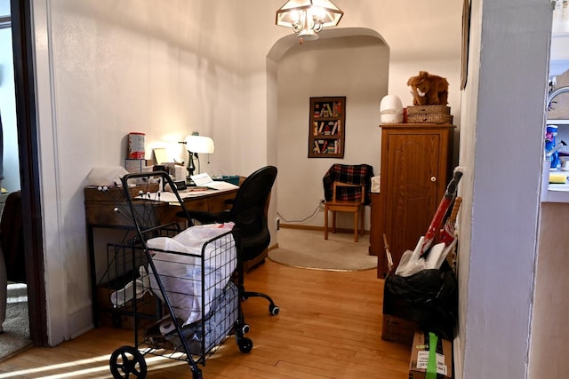 office with wood-type flooring