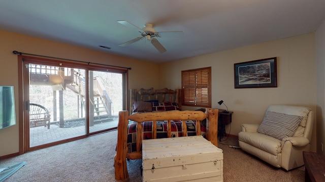 bedroom featuring carpet, ceiling fan, and access to outside