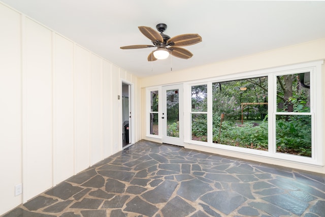 spare room with ceiling fan