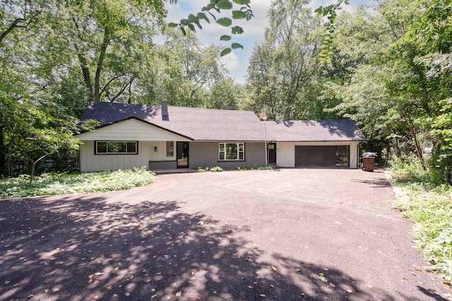 single story home featuring a garage