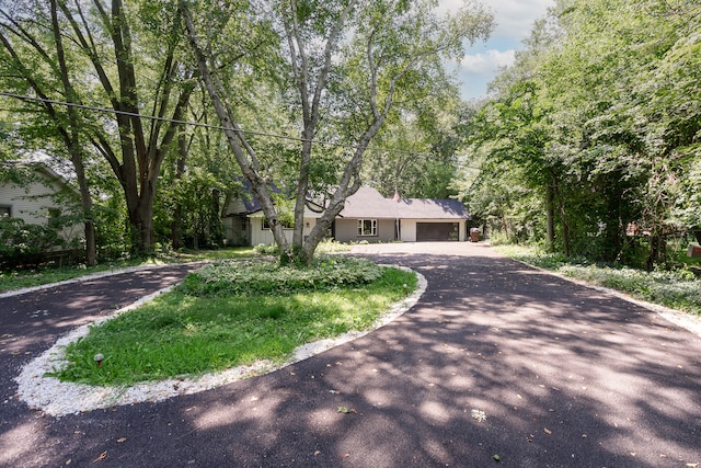 ranch-style home with a garage