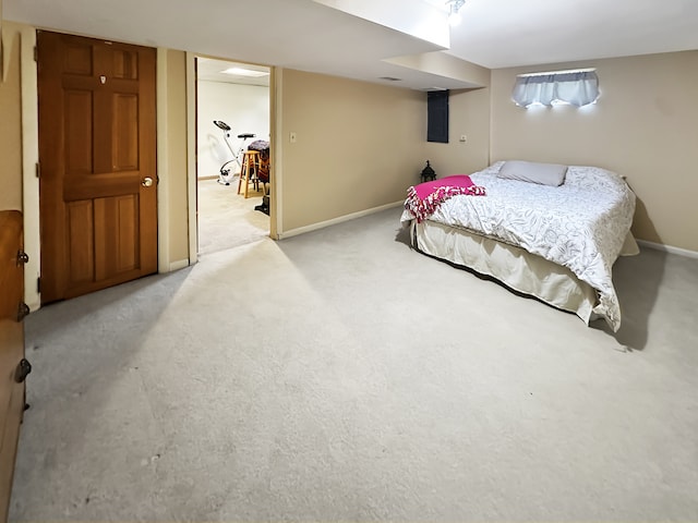 bedroom featuring light colored carpet