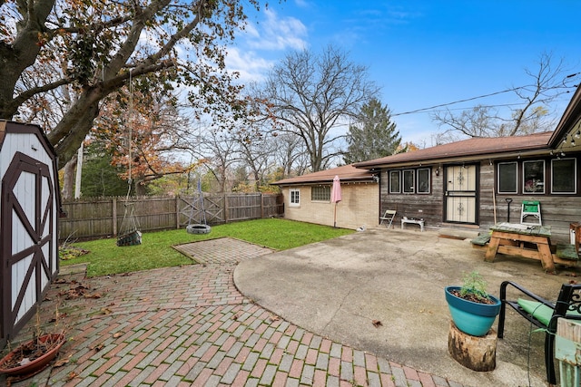 view of patio / terrace featuring a shed