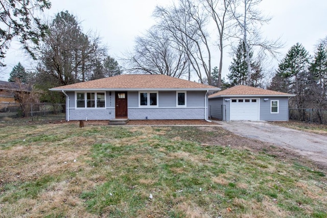 ranch-style home featuring a garage, an outdoor structure, and a front lawn