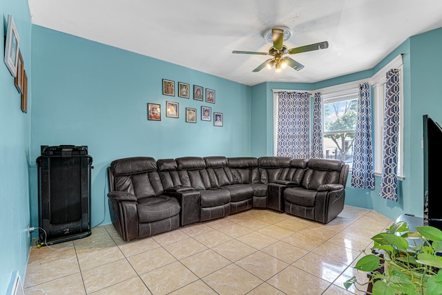 living room with light tile patterned floors and ceiling fan