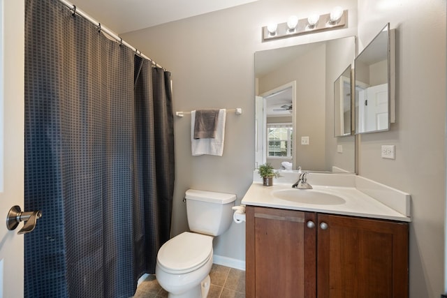 bathroom featuring vanity, toilet, a shower with curtain, and tile patterned flooring