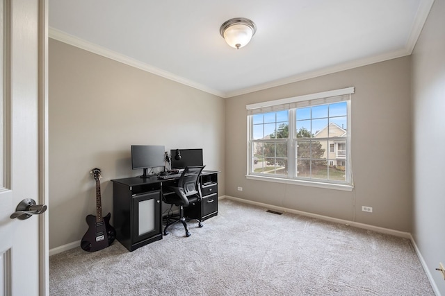 office space featuring crown molding and light carpet