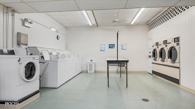 laundry room with washing machine and clothes dryer