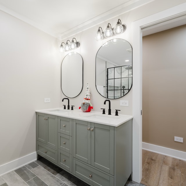 bathroom featuring vanity and wood-type flooring