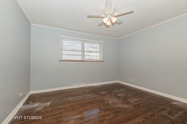 spare room with dark hardwood / wood-style floors, ceiling fan, and crown molding