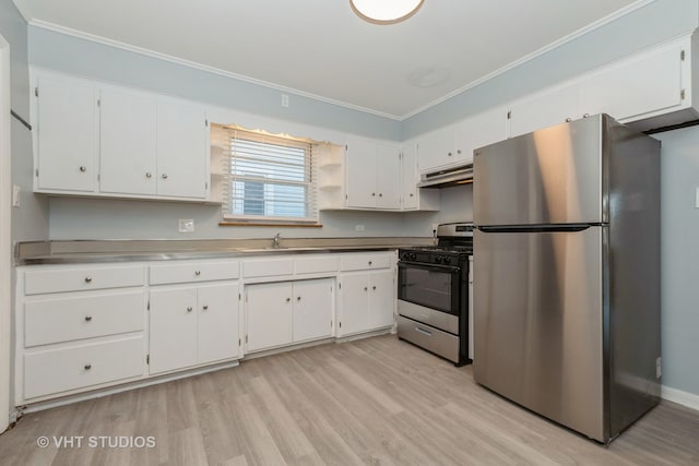 kitchen featuring ornamental molding, white cabinetry, range hood, light hardwood / wood-style floors, and stainless steel appliances