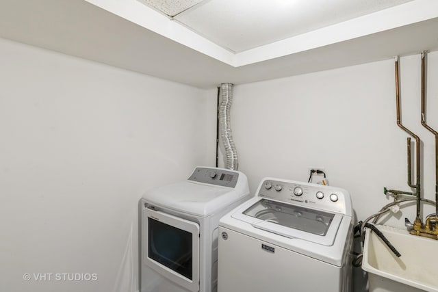 laundry room featuring independent washer and dryer