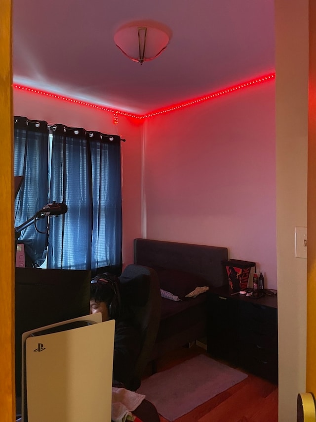 bedroom featuring wood-type flooring