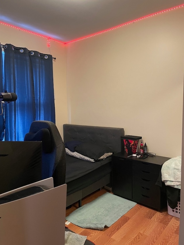 bedroom with light hardwood / wood-style floors